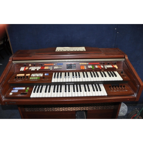 1060 - A TECHNICS U60 ELECTRONIC ORGAN with two keyboards and bass pedals and a piano stool (PAT fail due t... 