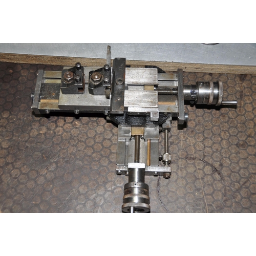 1062 - A PULTRA VINTAGE WATCHMAKERS LATHE with 'The Burnerd' three jaw chuck fitted, a drilling tailstock, ... 