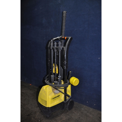 1069 - A KARCHER 432M SUPER PRESSURE WASHER with lance, three nozzles, and a shampoo nozzle (PAT pass and w... 