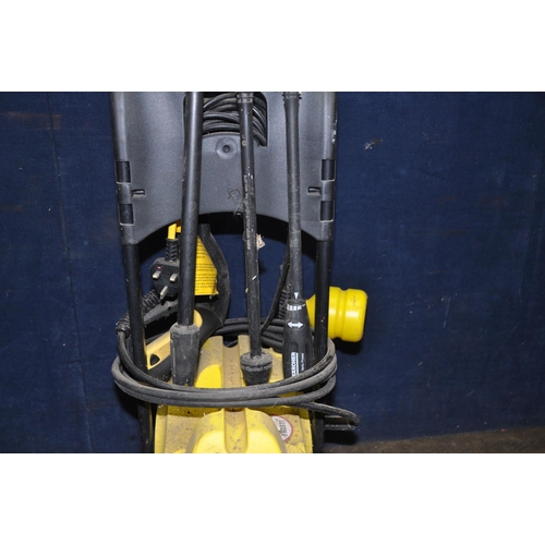 1069 - A KARCHER 432M SUPER PRESSURE WASHER with lance, three nozzles, and a shampoo nozzle (PAT pass and w... 