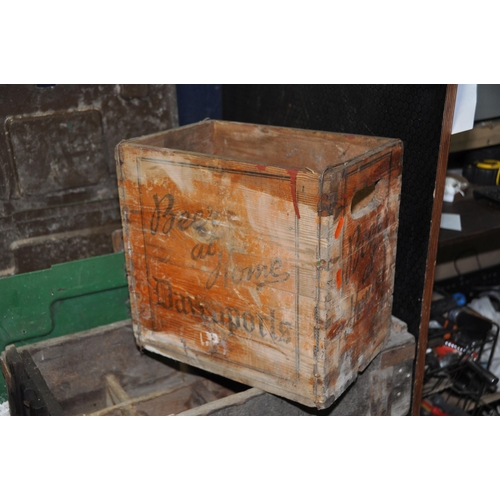 1096 - FIVE VINTAGE WOODEN PACKING AND BOTTLE CRATE AND A METAL AMMO BOX including a Davenports bottle crat... 