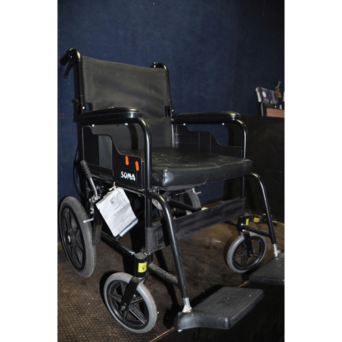 1100 - A SOMA SPARROW FOLDING WHEELCHAIR with two footrests