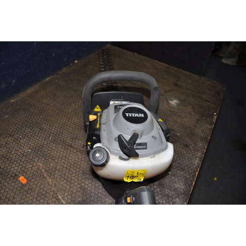 1107 - A TITAN TTL866HDC PETROL HEDGE TRIMMER (engine pulls freely but hasn't started)