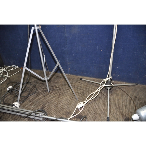 1111 - FOUR VINTAGE PHOTOGRAPHIC LIGHTS ON TRIPOD STANDS with aluminium shades and steel legs (UNTESTED and... 