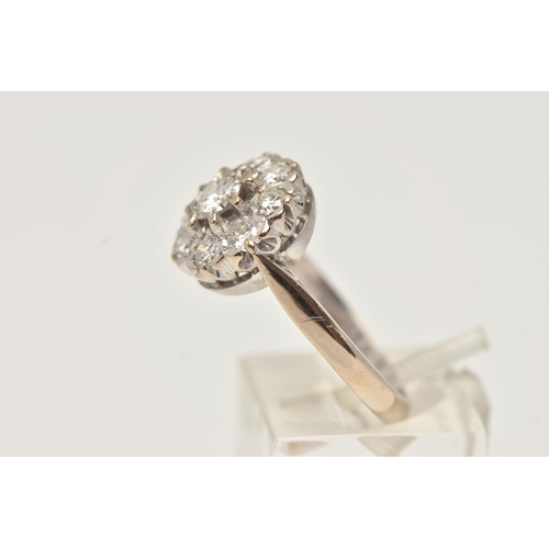 10 - AN 18CT WHITE GOLD DIAMOND CLUSTER RING, designed as two tiers of brilliant cut diamonds, estimated ... 