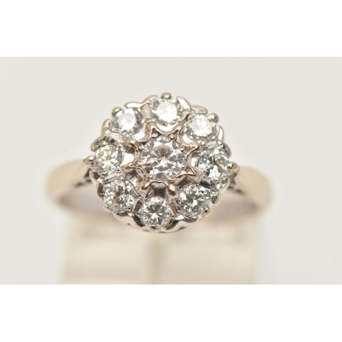 10 - AN 18CT WHITE GOLD DIAMOND CLUSTER RING, designed as two tiers of brilliant cut diamonds, estimated ... 