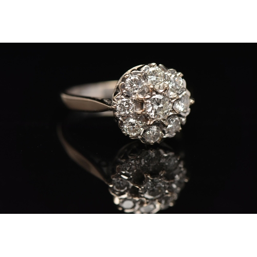 10 - AN 18CT WHITE GOLD DIAMOND CLUSTER RING, designed as two tiers of brilliant cut diamonds, estimated ... 