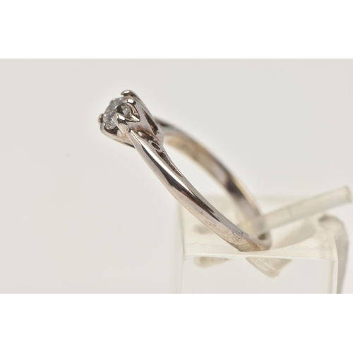 12 - A 9CT WHITE GOLD SINGLE STONE DIAMOND RING, designed as a brilliant cut diamond in a six claw settin... 