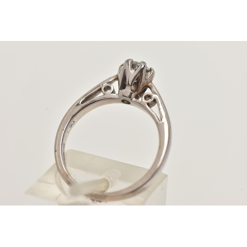 12 - A 9CT WHITE GOLD SINGLE STONE DIAMOND RING, designed as a brilliant cut diamond in a six claw settin... 