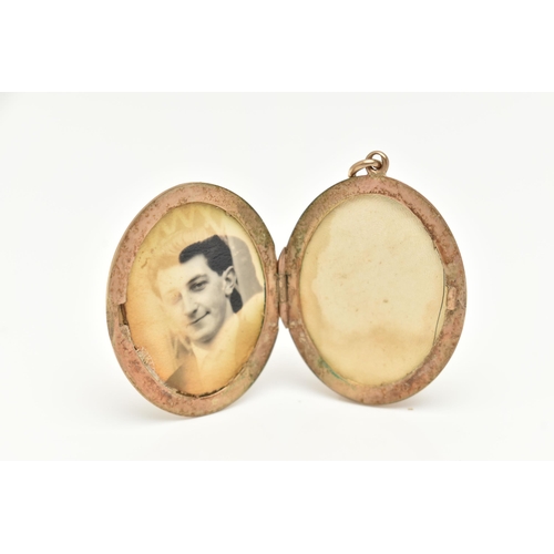 20 - A 9CT GOLD LOCKET, designed as an oval with scrolling acanthus detail to the front, approximate leng... 