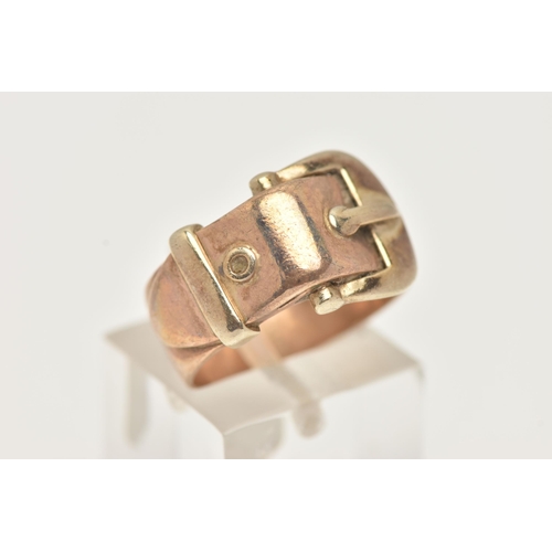 27 - A 9CT GOLD BUCKLE RING, a rose gold ring with buckle design detail, approximate width 12mm, hallmark... 