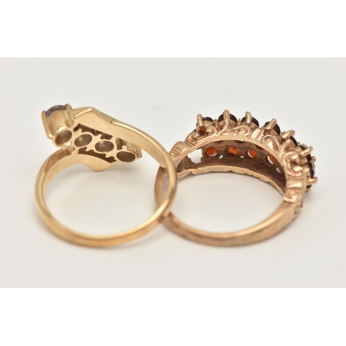 37 - TWO 9CT GOLD GEM SET RINGS, the first of a cross over design, with an asymmetrical row of four circu... 