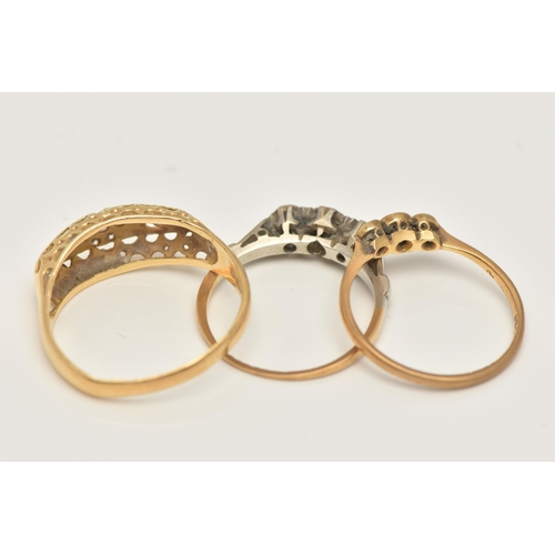 42 - THREE DIAMOND SET RINGS, the first an 18ct gold open work ring, set with a small cluster of single c... 