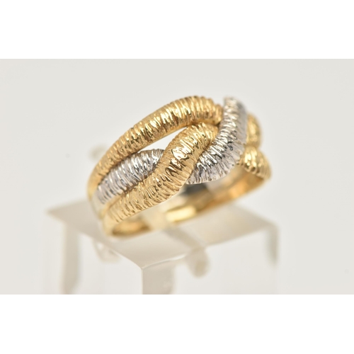 43 - AN 18CT BI-COLOUR GOLD RING, yellow and white gold textured bands interwoven, hallmarked 18ct London... 