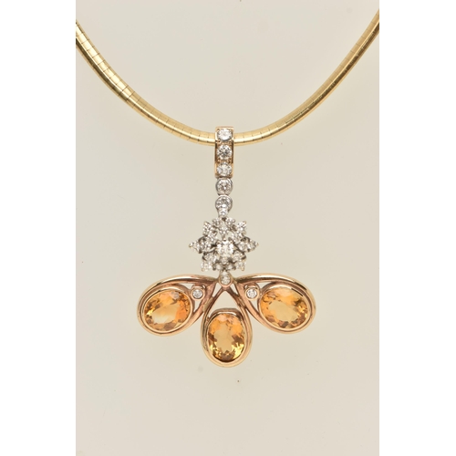 48 - A CITRINE AND DIAMOND PENDANT ON A CHAIN NECKLACE, the pendant designed as a central cluster of bril... 