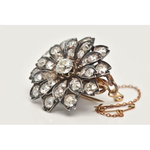 5 - A LATE VICTORIAN DIAMOND FLORAL BROOCH, set with a principal cushion-shape old-cut diamond, measurin... 