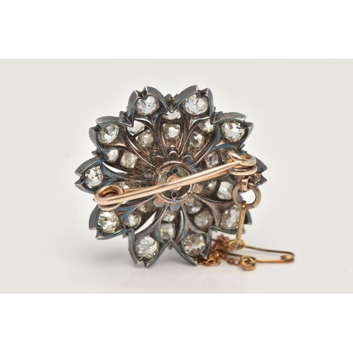 5 - A LATE VICTORIAN DIAMOND FLORAL BROOCH, set with a principal cushion-shape old-cut diamond, measurin... 