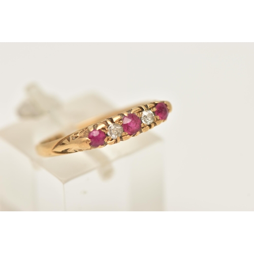 51 - AN EARLY 20TH CENTURY 18CT GOLD RUBY AND DIAMOND RING, designed as three circular cut rubies intersp... 