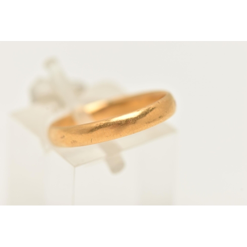 53 - A POLISHED THIN 22CT GOLD BAND RING, misshapen band, approximate band width 3.0mm, hallmarked 22ct B... 