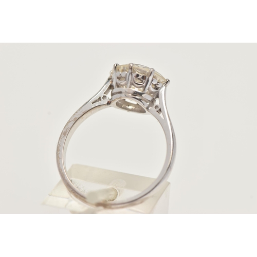 7 - A DIAMOND SINGLE STONE RING, set with a round brilliant cut diamond, within an eight claw setting, t... 