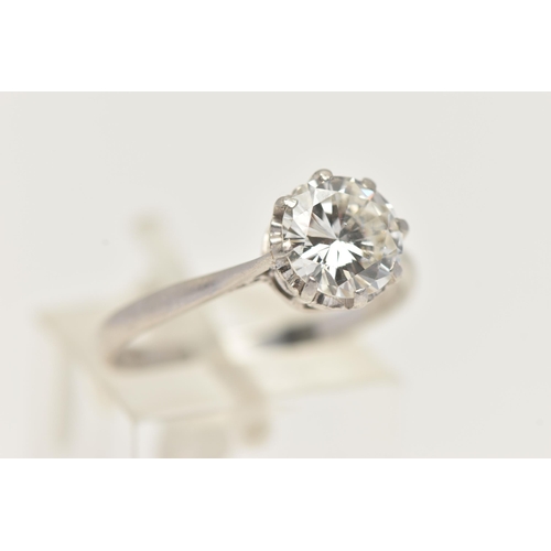 8 - A DIAMOND SINGLE STONE RING, set with a round brilliant cut diamond, within an eight claw setting, t... 