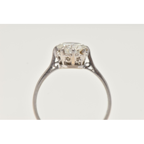 8 - A DIAMOND SINGLE STONE RING, set with a round brilliant cut diamond, within an eight claw setting, t... 