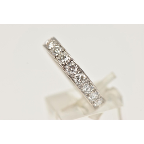 9 - A MID 20TH CENTURY WHITE METAL DIAMOND FULL CIRCLE ETERNITY RING, set with approximately twenty roun... 