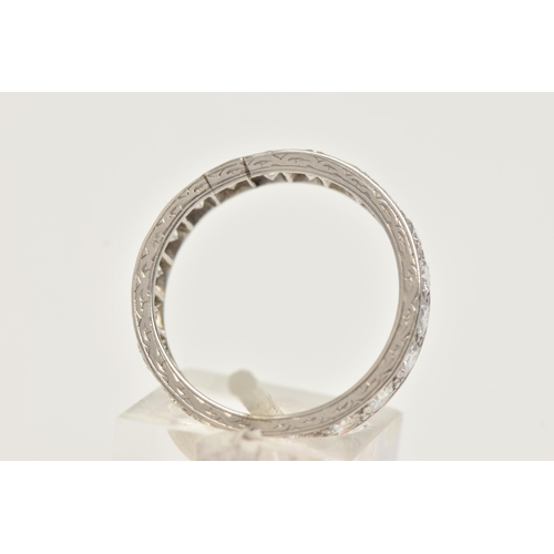 9 - A MID 20TH CENTURY WHITE METAL DIAMOND FULL CIRCLE ETERNITY RING, set with approximately twenty roun... 