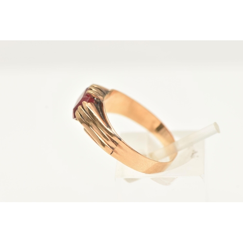 60 - A MID 20TH CENTURY SYNTHETIC RUBY SINGLE STONE RING, set with a rectangular shape faceted synthetic ... 