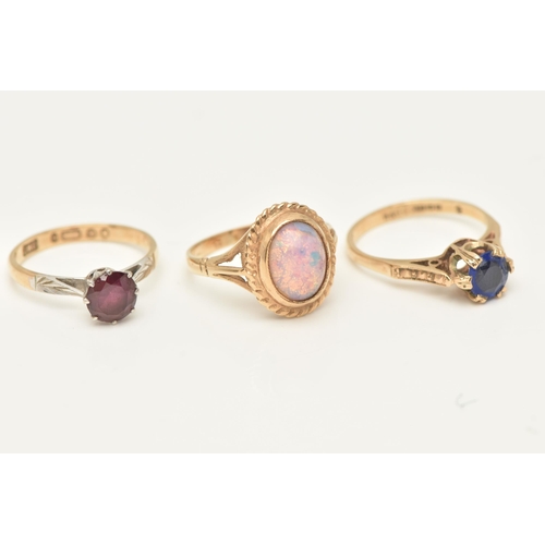 61 - THREE 9CT GOLD GEM-SET RINGS, to include a 1950s garnet ring, set with a circular shape garnet gem, ... 