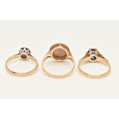 61 - THREE 9CT GOLD GEM-SET RINGS, to include a 1950s garnet ring, set with a circular shape garnet gem, ... 