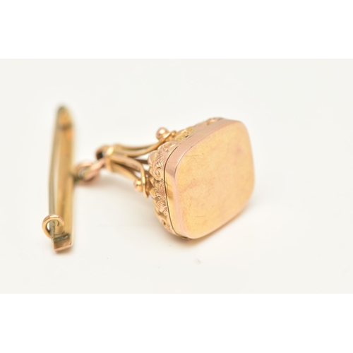 62 - AN EARLY 20TH CENTURY 9CT YELLOW GOLD HINGED PHOTOGRAPH FOB SEAL, designed with scroll embossed deta... 