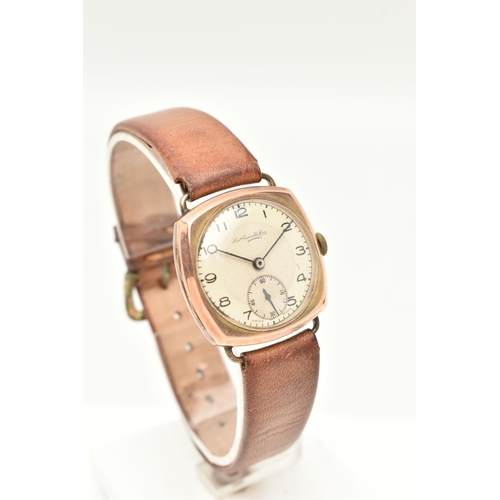 72 - A VINTAGE 1940S 9CT ROSE GOLD THOMAS RUSSELL & SON WRISTWATCH, the circular silver dial, with black ... 