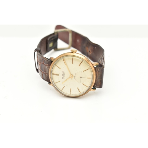 73 - A VINTAGE 9CT YELLOW GOLD BERNEX WRISTWATCH, the silver coloured dial with illuminous gilt hourly ap... 