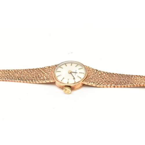 74 - A ZENITH 9CT GOLD WRISTWATCH, the silver colour diamond, with gilt black enamel hourly applied marke... 