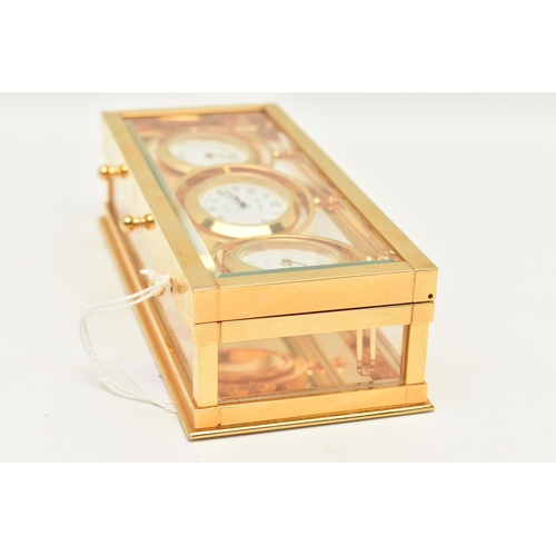 102 - JENS OLSEN TRIPLE DIAL BRASS CLOCK, the three dials for temperature, time and humidity in gimbal mou... 