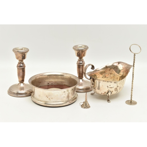 122 - A SELECTION OF MAINLY SILVERWARE, to include a pair of silver dwarf candlesticks, hallmark for Birmi... 