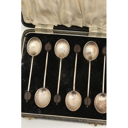 126 - A CASED SET OF FOUR SILVER OPEN SALTS, AND TWO CASED SETS OF SILVER SPOONS, the late Victorian silve... 