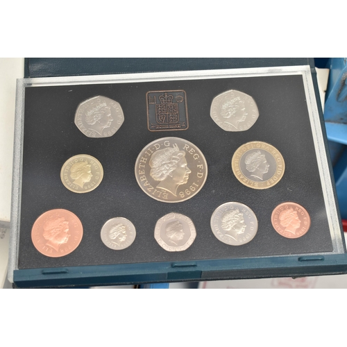 145 - TWO LARGE AND HEAVY PLASTIC TUBS AND A CARDBOARD BOX OF MIXED COINAGE AND UK YEAR PROOF SETS, to inc... 