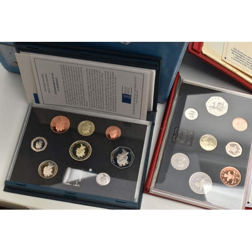 145 - TWO LARGE AND HEAVY PLASTIC TUBS AND A CARDBOARD BOX OF MIXED COINAGE AND UK YEAR PROOF SETS, to inc... 