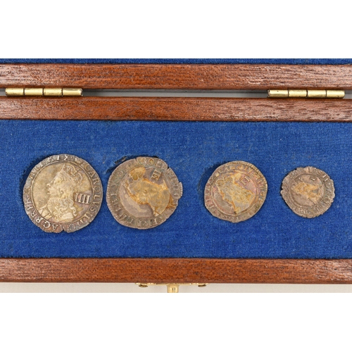 151 - A CASED SET OF CHARLES II HAMMERED MAUNDY COINS FOURPENCE, THREEPENCE, TWOPENCE and PENNY COINS (UND... 