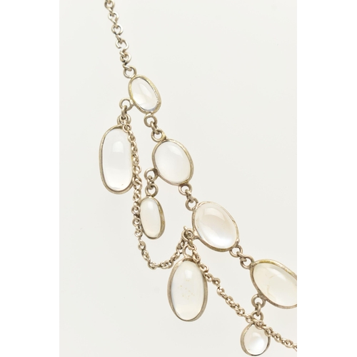 76 - A MOONSTONE FRINGE NECKLACE, designed as a series of oval moonstone cabochons, suspended from a belc... 