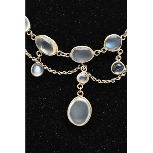 76 - A MOONSTONE FRINGE NECKLACE, designed as a series of oval moonstone cabochons, suspended from a belc... 