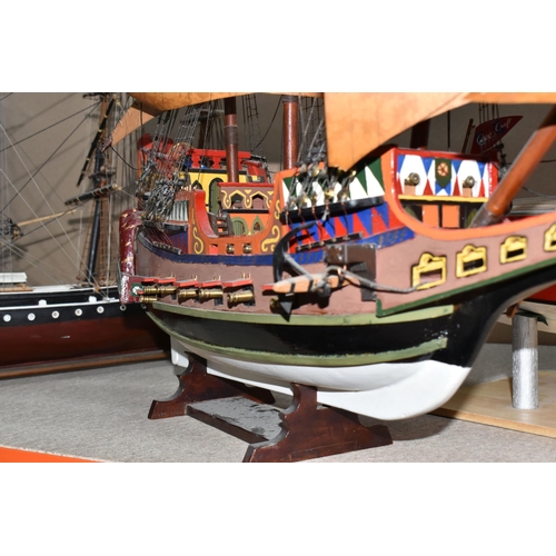 324 - THREE KIT BUILT MODEL SAILING SHIPS, comprising a model of 'The Golden Hind' with a certificate pres... 