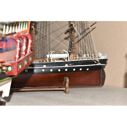 324 - THREE KIT BUILT MODEL SAILING SHIPS, comprising a model of 'The Golden Hind' with a certificate pres... 