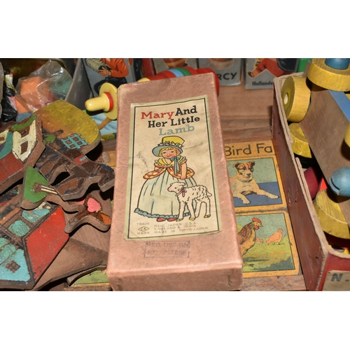 330 - A COLLECTION OF VINTAGE TOYS, to include boxed and unboxed wooden Brio Stacking toys, boxed small wo... 