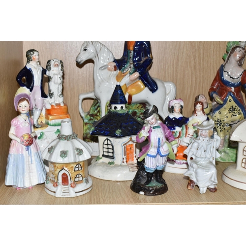 337 - A GROUP OF MAINLY STAFFORDSHIRE FIGURES AND COTTAGES, to include a flatback figure group of two figu... 