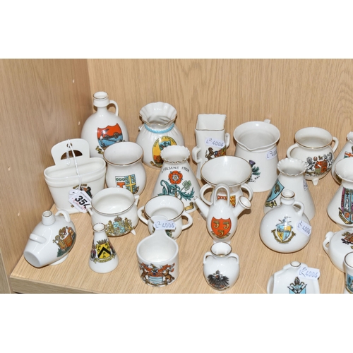 354 - A QUANTITY OF WH GOSS CRESTED WARE VESSELS, over ninety pieces, in forms to include an ancient salt ... 