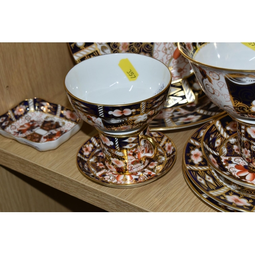 357 - A GROUP OF ROYAL CROWN DERBY IMARI 2451 PATTERN TEAWARE, comprising an early nineteen century dish (... 