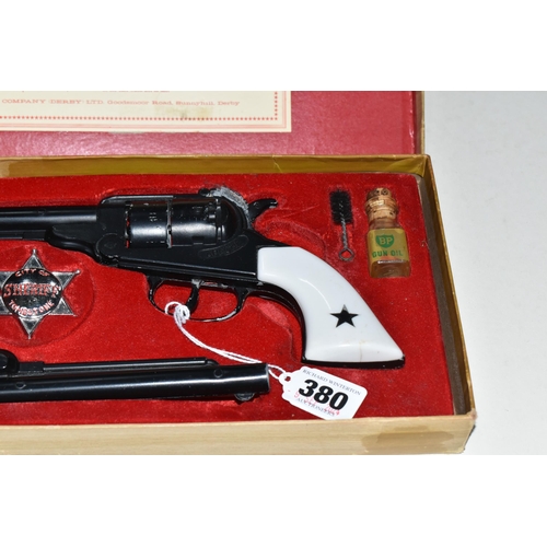 380 - A BOXED B.C.M. OUTLAW GUNS SET, comprising a pair of replica Remington Apache calibre .44 cap firing... 